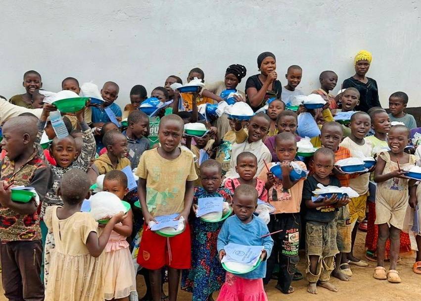 supporting orphan refugees in nakivale camp orphans photo with food