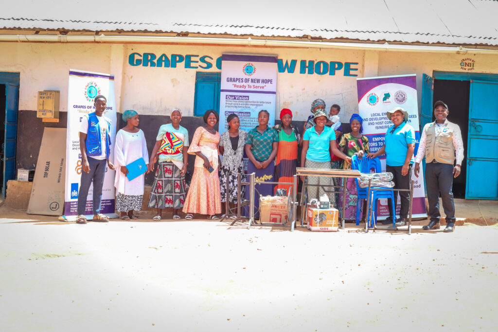 Empowering Refugee and Host Community Youth Through Digital and Vocational Skills Development in Nakivale Refugee Settlement tailoring group 02